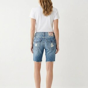 Distressed True Religion Jeans in Light Blue size W32 image 2