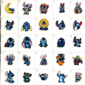 May include: A collection of Stitch character charms in various poses and outfits. The charms are primarily blue with accents of other colors, including orange, yellow, and pink. Each charm is a different design.