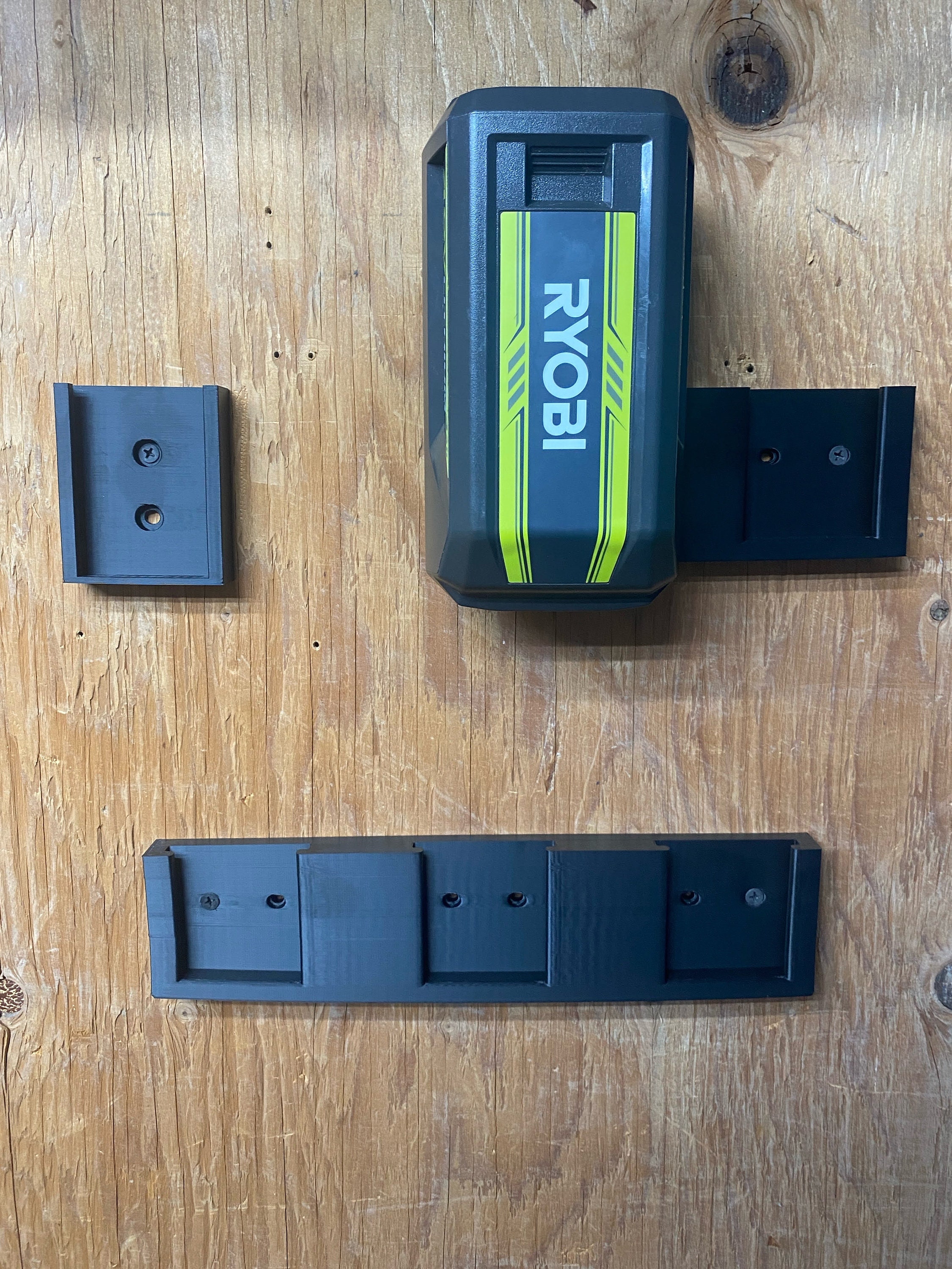 Ryobi 40V battery wall mounts - durable and space-saving organizer. Multiple battery options!