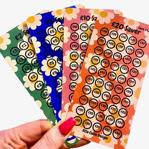 May include: Four colourful cards with a daisy pattern. Each card has a different amount of circles with a number inside. The cards are labelled "£2 Saver", "£5 Saver", "£10 Saver", and "£20 Saver". The text "Save £1000" is at the top of the card labelled "£20 Saver". The text "Etta Callie Designs" is at the bottom of the card labelled "£20 Saver".