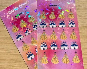 Puede incluir: Dos hojas de pegatinas rosas e iridiscentes con un diseño de princesa y castillo. Las pegatinas dicen "Castle Coins" y "Etta Callie Designs".