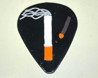 Cigarette and match guitar pick