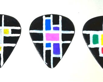 Mondrian guitar picks black background