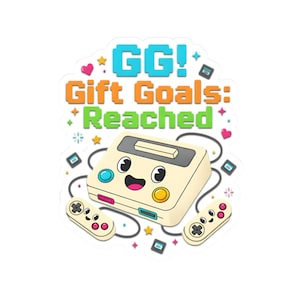 Puede incluir: Una pegatina con una consola de videojuegos retro con una cara sonriente, dos mandos a juego y el texto "GG! Gift Goals: Reached". El diseño incluye estrellas, corazones e iconos de cartuchos de juego.