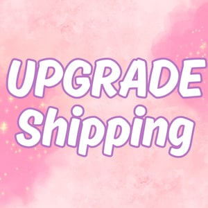 May include: Pink and white text on a pink background with sparkles. The text reads "Upgrade Shipping".