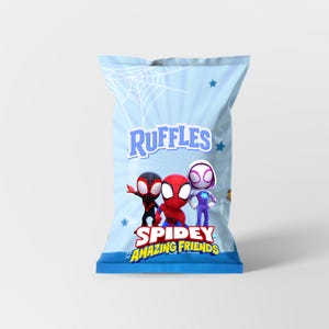 May include: A light blue bag of Ruffles potato chips featuring the Spidey and His Amazing Friends characters. The bag has a light blue background with a spider web design and the Ruffles logo.
