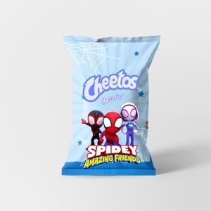 May include: A light blue bag of Cheetos Crunchy snacks featuring the Spidey and His Amazing Friends characters. The bag has a spiderweb design, stars, and the Cheetos logo.
