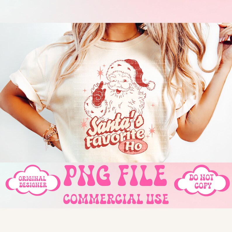 May include: A white t-shirt featuring a red and white illustration of Santa Claus with the text "Santa's Favourite Ho" in a retro font. The image is on a white background and the text is in a pink cloud.