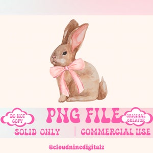 May include: A watercolor illustration of a brown bunny rabbit wearing a pink bow. The bunny is sitting on a white background. The image is a PNG file and is for commercial use only.