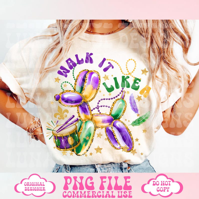 May include: Cream-colored t-shirt featuring a balloon animal design in purple, green, and gold, with the text "WALK IT LIKE A". The design includes a drum, stars, and feathers. The shirt is a PNG file for commercial use.