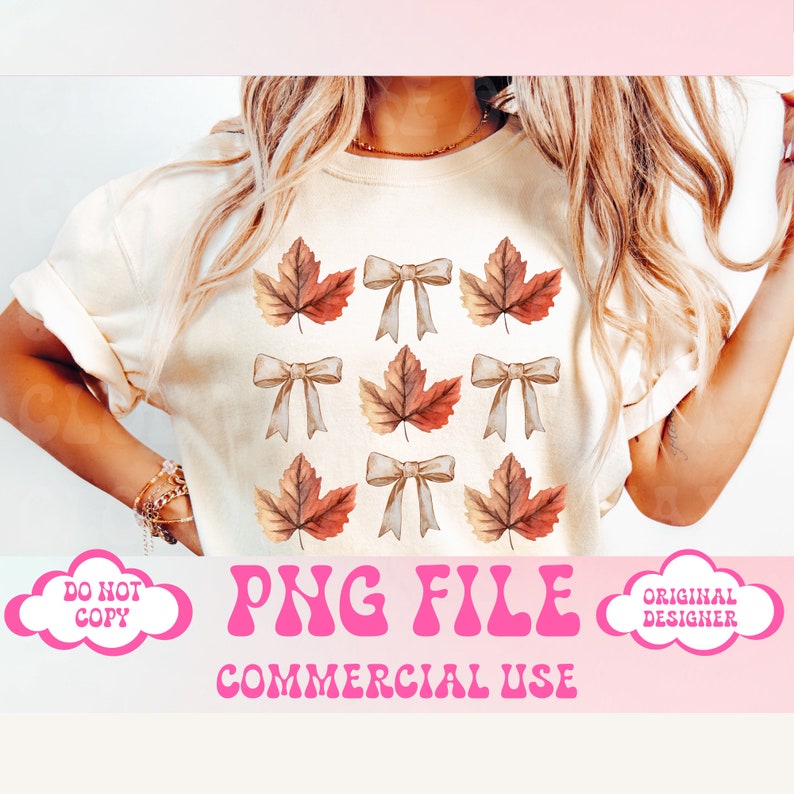 May include: A white t-shirt featuring a pattern of brown and orange maple leaves and brown bows. The text "PNG FILE COMMERCIAL USE" is printed in pink below the image. The words "DO NOT COPY" and "ORIGINAL DESIGNER" are printed in pink in speech bubbles on either side of the image.