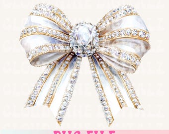 May include: A white bow with gold trim and a large, clear rhinestone in the center. The bow is decorated with smaller rhinestones.