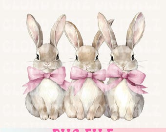 May include: Three brown bunnies with pink bows sitting side by side. The bunnies are facing forward with their ears perked up.