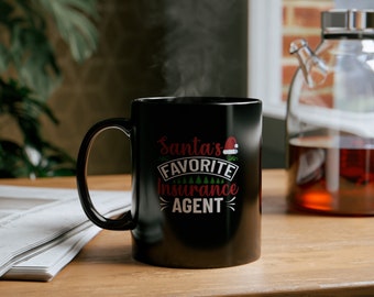 Santas Lieblings-Versicherungsagent, schwarze Tasse (11 Unzen, 15 Unzen) Feiertage