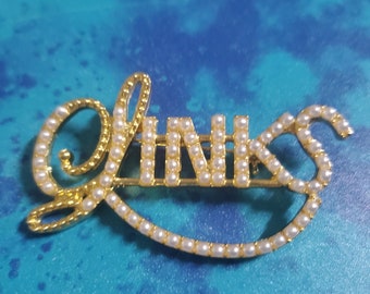 Links Pin, links ketting