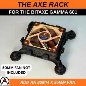 May include: Black and tan fan assembly with the text "THE AXE RACK FOR THE BITAXE GAMMA 601". The fan has brown blades and a blue and white label. The text "80MM FAN NOT INCLUDED" is also visible. The base has a logo and the text "ADD AN 80MM X 25MM FAN".