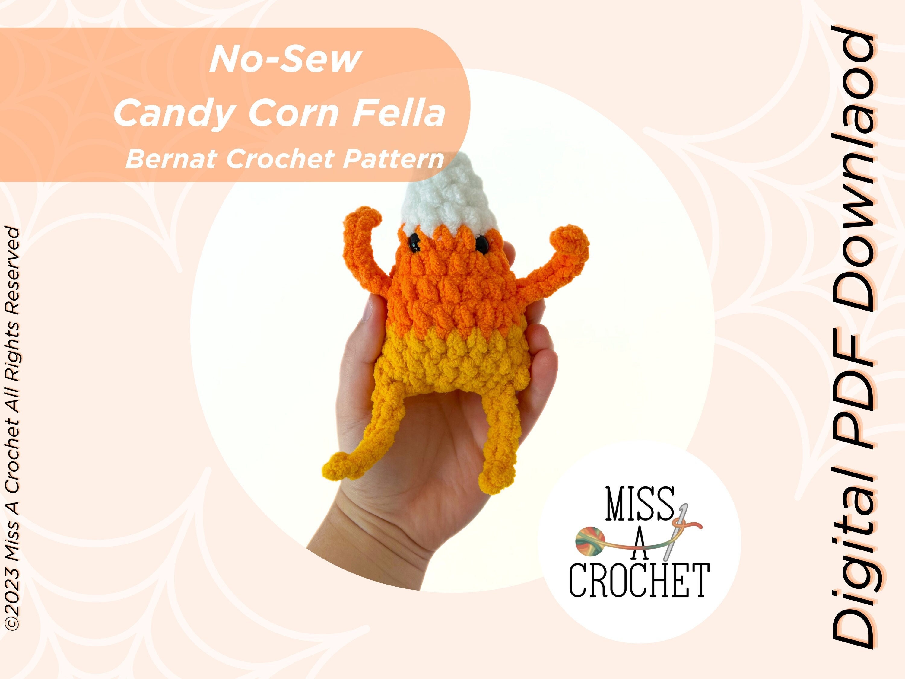 39 Candy Corn Crochet Patterns to Sweeten Your Autumn Decor 11 No-Sew Candy Corn Fella Crochet Pattern: Blanket Yarn