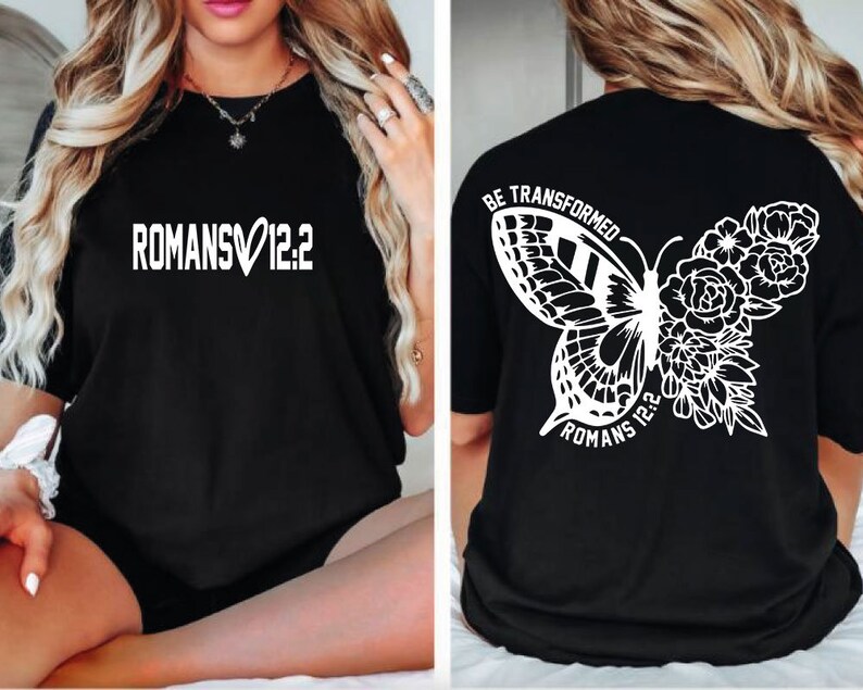 May include: Black t-shirt with white text "ROMANS&hearts;12:2" on the front and a white butterfly with flowers and the text "BE TRANSFORMED ROMANS 12:2" on the back.