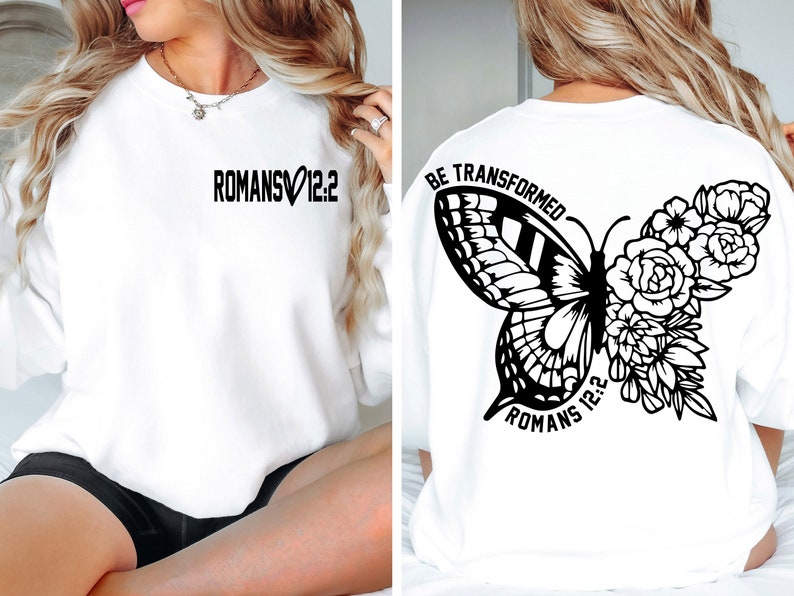May include: White sweatshirt with the text "Romans 12:2" on the front and a black butterfly with flowers and the text "Be Transformed Romans 12:2" on the back.