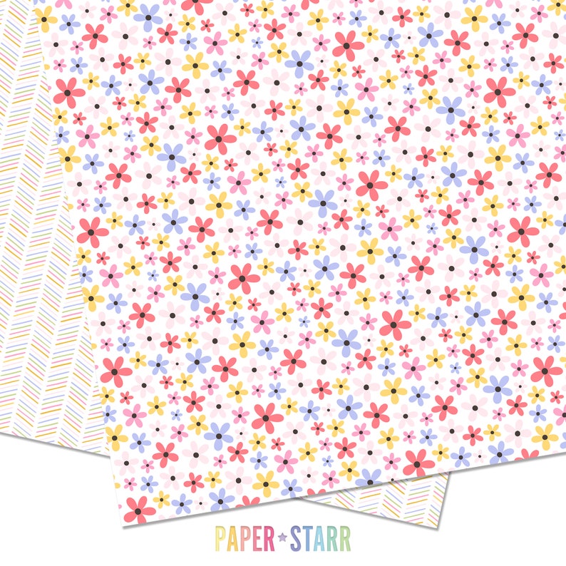 May include: A white background with a repeating pattern of small pink, yellow, blue, and red flowers. The flowers are scattered randomly across the background. There are also small black dots scattered throughout the background. The text "PAPER + STARR" is at the bottom of the image.