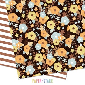 May include: A seamless pattern featuring a repeating design of various sized flowers in shades of yellow, orange, and blue on a dark brown background. The flowers are surrounded by small white stars and brown leaves.