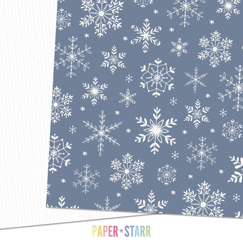 May include: A seamless pattern featuring white snowflakes on a light blue background. The snowflakes are of various sizes and shapes, creating a festive wintery design.