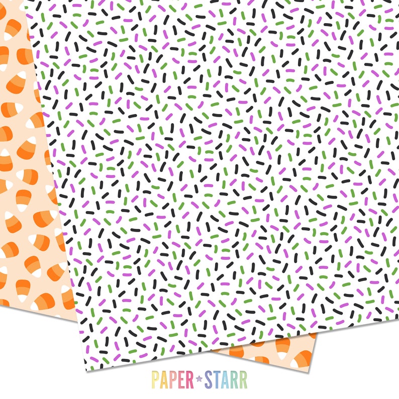 Puede incluir: Dos hojas de papel con patrones. Una hoja tiene un fondo blanco con confeti negro, verde y morado. La otra hoja tiene un fondo naranja con ma&iacute;z dulce blanco y naranja. El texto "PAPER + STARR" est&aacute; impreso en la parte inferior de la imagen.