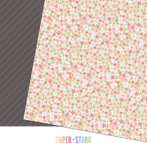 May include: A white background with a repeating pattern of small pink and green flowers. The flowers are outlined in black and have a small black dot in the center. The text "PAPER + STARR" is at the bottom of the image.