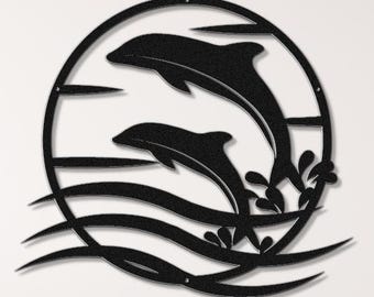 May include: Black metal wall art featuring two dolphins jumping out of the water with waves and seaweed. The dolphins are silhouetted against a circular background.