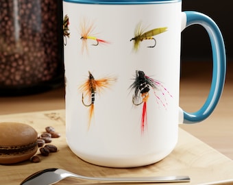 Fly fishing 15 oz. coffee mug features a variety of fishing flies. Coffee and fly tying are a great combo. Good fishing dad gift.