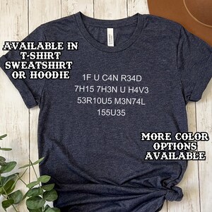 May include: Dark navy blue t-shirt with the text "1F U C4N R34D 7H15 7H3N U H4V3 53R10U5 M3N74L 155U35". The shirt is available in a t-shirt, sweatshirt, or hoodie. More color options are available.
