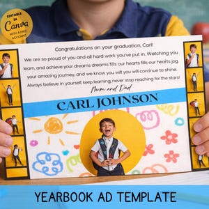 May include: A graduation yearbook ad template held by a person. The ad features a photo of a smiling boy, the name "Carl Johnson", and a congratulatory message from "Mom and Dad". The ad includes the text "YEARBOOK AD TEMPLATE".