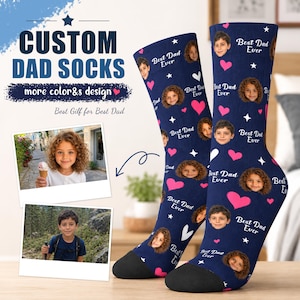 May include: Navy blue custom socks featuring faces, hearts, and stars. The text reads "Best Dad Ever." These personalised socks are a unique gift idea.