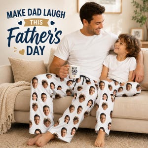 Op de afbeelding: Een witte mok met de tekst "BEST DAD EVER" en een hartontwerp wordt vastgehouden door een persoon die een witte pyjamabroek draagt ​​met meerdere gezichten. De tekst "MAKE DAD LAUGH THIS FATHER'S DAY" is weergegeven in blauw en goud.