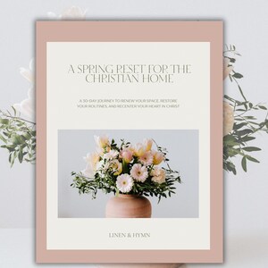 May include: A book cover with a soft pink border and a cream-coloured interior. The title reads "A Spring Reset for the Christian Home." Below is a floral arrangement in a terracotta vase. The text "Linen & Hymn" is at the bottom.