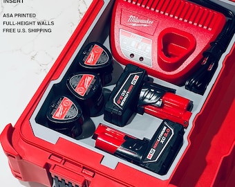 May include: A red Milwaukee Packout organizer case containing a grey custom insert for M12 batteries and a charger. The insert holds three small batteries and two larger M12 Redlithium XC 3.0 batteries. Text reads: CUSTOM PACKOUT BATTERY ORGANIZER, M12 CHARGER + BATTERY INSERT, ASA PRINTED, FULL-HEIGHT WALLS.