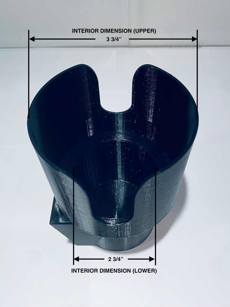 May include: Black, 3D-printed cup holder with a unique design. The upper interior dimension is 3 3/4 inches, and the lower interior dimension is 2 3/4 inches. The text on the image reads "INTERIOR DIMENSION (UPPER)" and "INTERIOR DIMENSION (LOWER)".