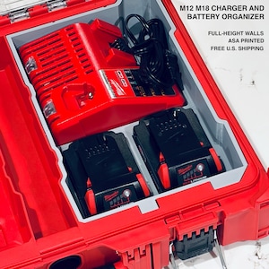May include: A red Milwaukee Packout organizer containing a red M12 M18 charger and two black Redlithium batteries. The insert features full-height walls and is ASA printed. Text reads: CUSTOM PACKOUT ORGANIZER, M12 M18 CHARGER AND BATTERY ORGANIZER.