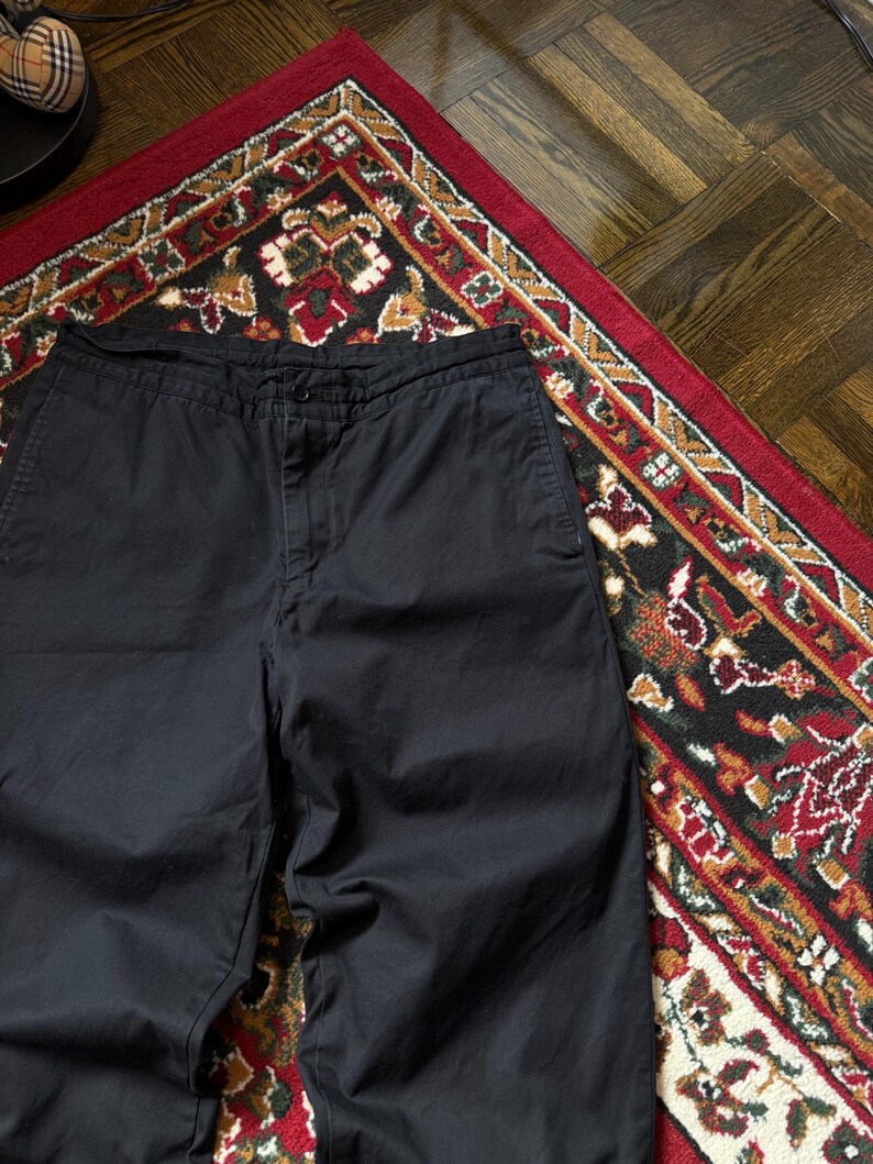 May include: A distressed wooden sign with the words "Welcome to our home" in white lettering. The sign has a rustic finish, ideal for a front porch or hallway, creating a welcoming atmosphere.