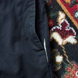 May include: A rectangular wooden sign, distressed for a rustic look, bearing the handwritten text "Welcome to our home". The sign is designed for home decor, suitable for indoor or outdoor use, and has a welcoming aesthetic.