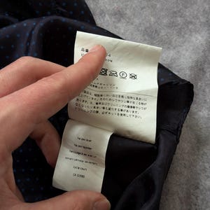 May include: A rustic wooden sign with the text "Welcome to our home" in white lettering. The sign features a distressed finish and a simple, inviting design, perfect for a front porch or entryway.