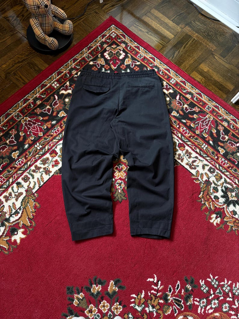 May include: A distressed wooden sign, reading "Welcome to our home" in white lettering. The sign has a rustic finish, ideal for adding a welcoming touch to a front door or hallway.