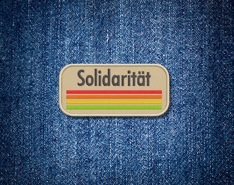 Solidarität Patch – Regenbogen Aufnäher 9 cm | Stickpatch gegen Hass | Handmade Statement | Politischer Aufnäher