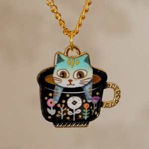 Cool funky Cat in a Teacup Necklace, quirky gold teacup cat necklace for women
