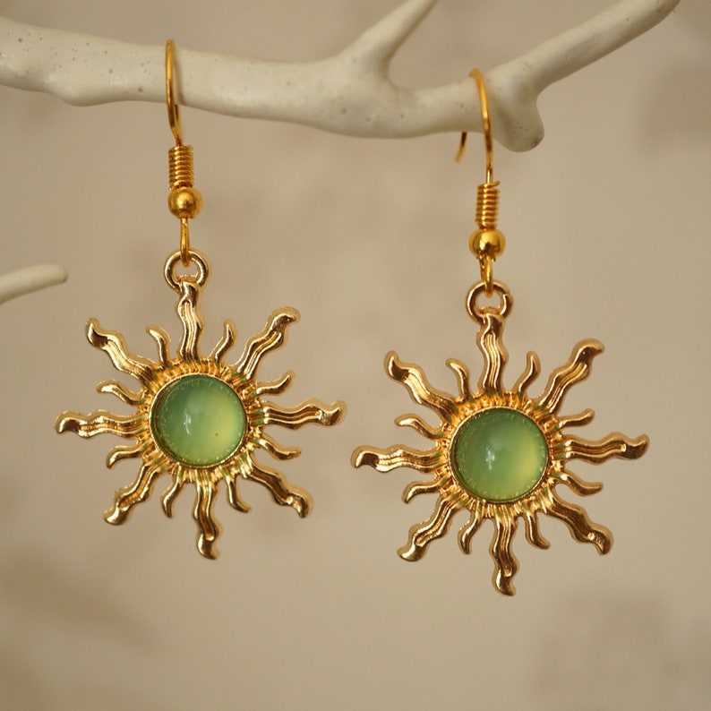 Green sun earrings