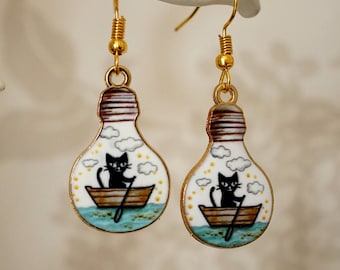 Cat in a Boat Earrings, Cool quirky gold lightbulb cat in a boat drop earrings for women