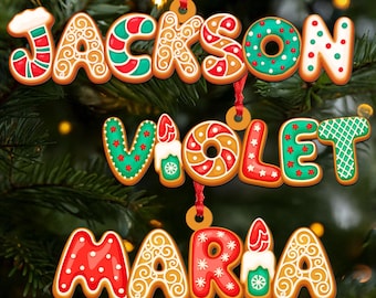 May include: Gingerbread-style Christmas ornaments spelling out the names "JACKSON", "VIOLET", and "MARIA". Each letter is decorated with red, green, and white icing, and strung with red ribbon for hanging on a Christmas tree.