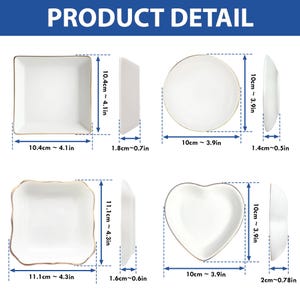 May include: Product detail image showing four white ceramic dishes with gold rims. The dishes include a square, a round, a square with scalloped edges, and a heart shape. Measurements are provided in centimetres.