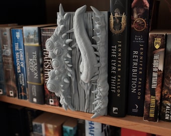 Imiter un coin livre, décoration et serre-livres imprimés en 3D sur le thème D&D, horreur fantastique