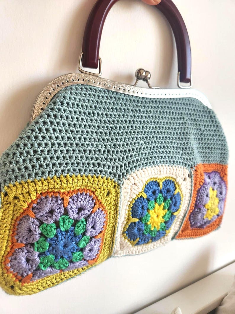 Materials: Cotton yarn, metal frame, acrylic handles